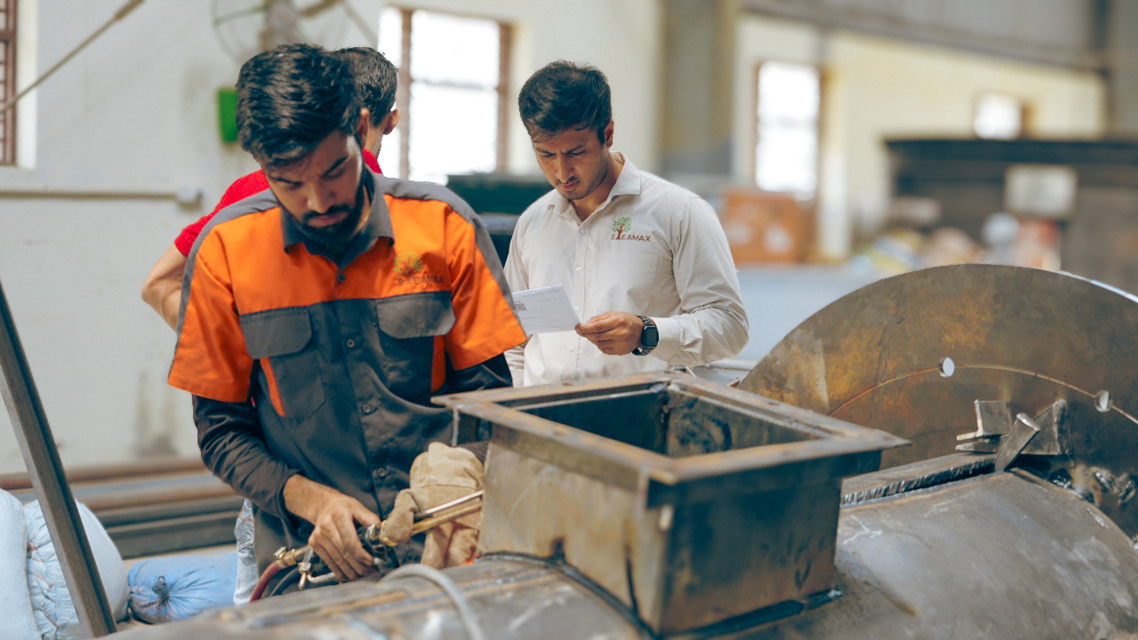 Employees working in steamax for biomass solutions